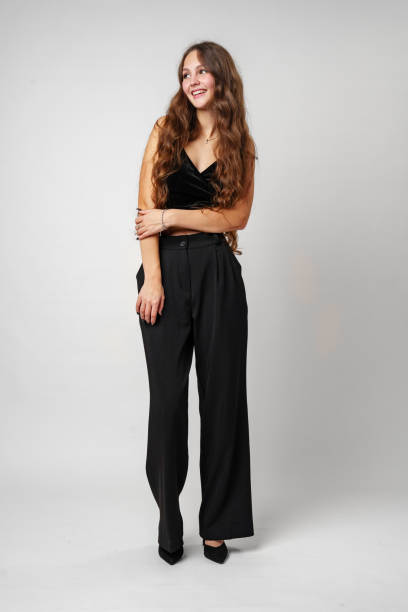 istock Woman in Black Top and Pants 2153338732