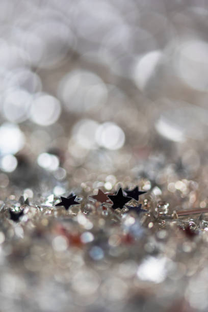 Sparkle abstract glitter confetti with light colored stars