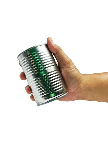 istock Hand holding Food cans isolated on a white background 2153340631