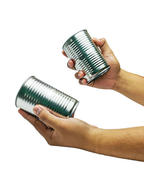 istock Hand holding Food cans isolated on a white background 2153340646