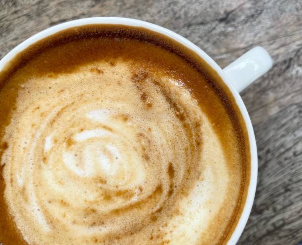istock Hot coffee with milk on cup 2153341766