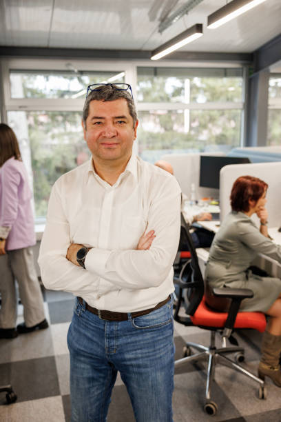 istock Satisfied mature businessman in modern office 2153341899