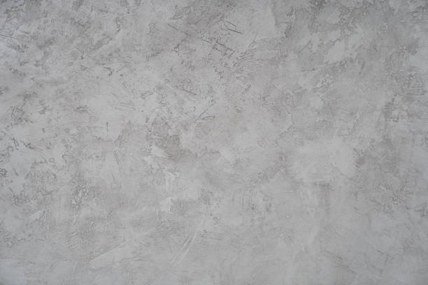 istock Grey marble stone of rough texture. Overlay for your design with space to copy. Grey texture of concrete, stone wall. Cracks and scratchers. 2153343159