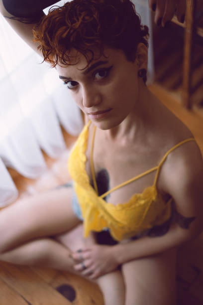 istock Young Beautiful Tattooed Woman 2153346485