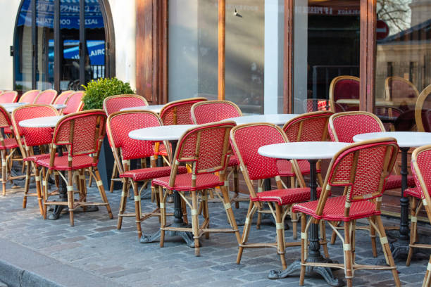 istock Empty Parisian Cafe with Red Chairs in Paris, France 2153347535