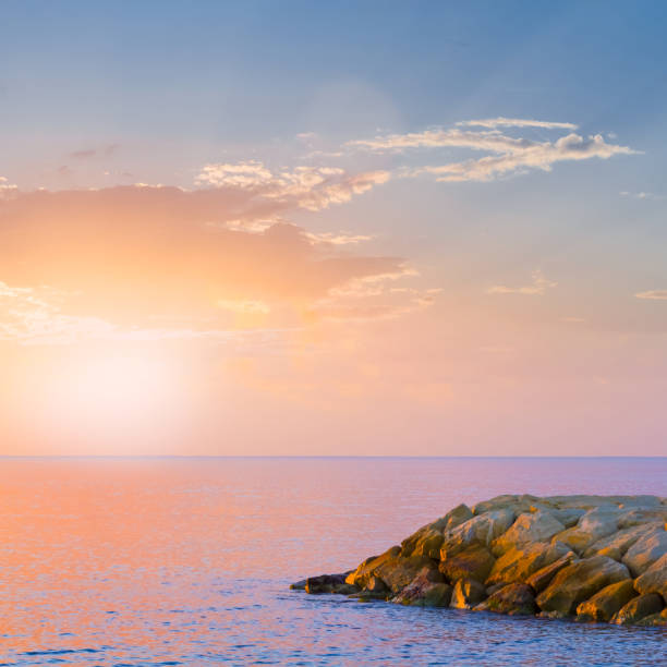 istock summer sea coast at the dramatic sunset 2153350682