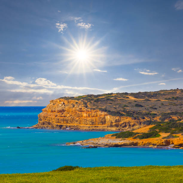 stony sea coast at the storm under a sparkle sun