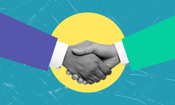 istock A handshake of businessmen. Modern design with a positive context. 2153358206