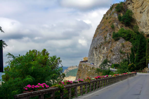 Mountain road through a valley in the Dolomites