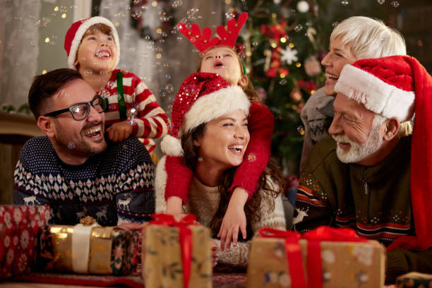 istock Cheerful extended family talking while celebrating New Year at home. 2153359920