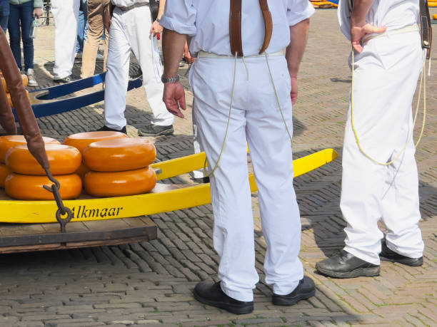 Men with carriers on famous cheese market in Alkmaar
