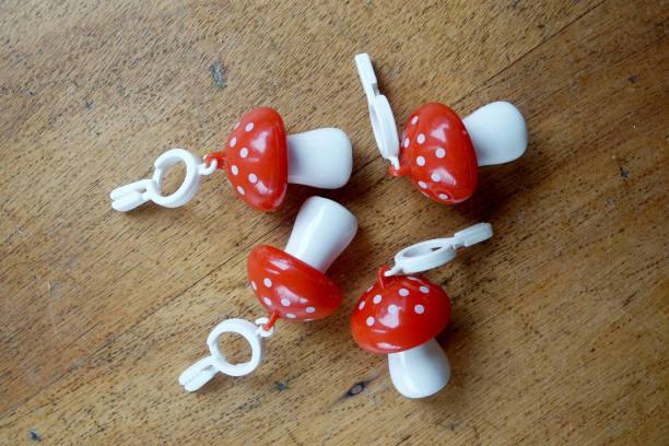 istock Vintage set mushroom shaped table cloth holders 2153361762