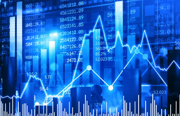 istock stock market index graph. Candlestick chart, skylines and bar chart 2153363490