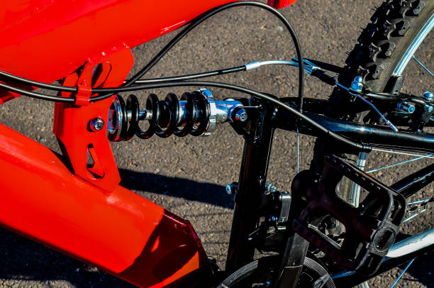 istock A red bicycle with a black chain and black seat 2153365894