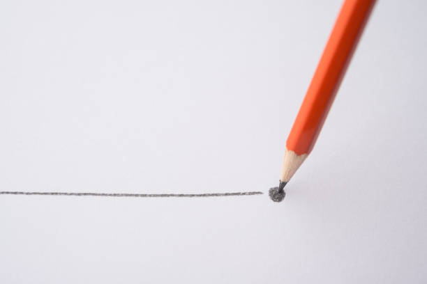 istock Red color pencil write line and end point on white paper background copy space. 2153367437