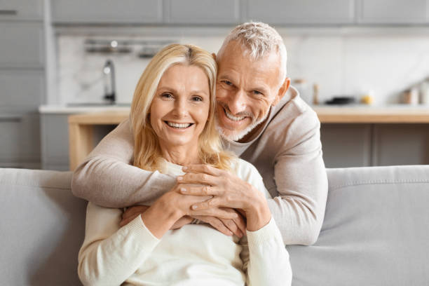 istock Mature couple smiling and hugging tightly 2153370965