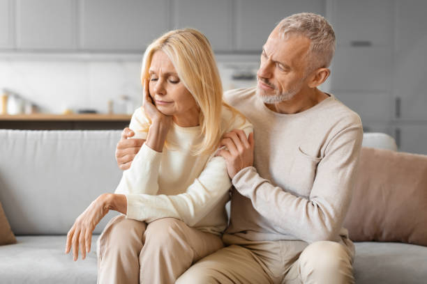 istock Loving supportive senior man husband comforting his upset wife 2153371081