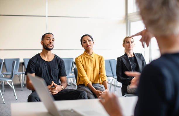istock Diverse Team Engages at Corporate Seminar 2153372351