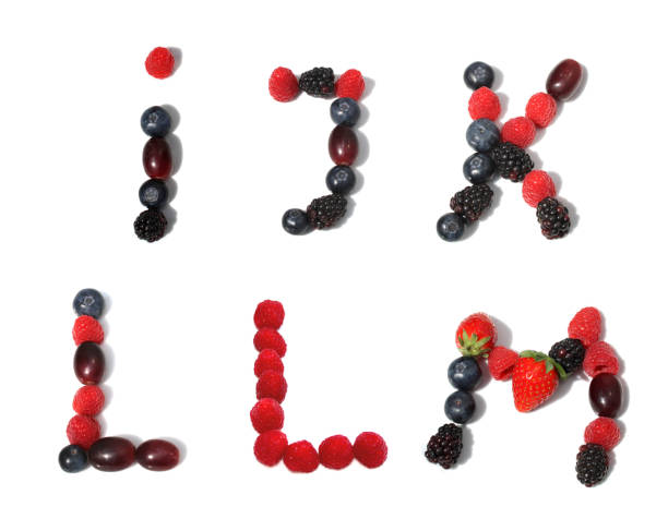 istock letter i with point k, letters L M made from raspberry, blackberry, strawberry, green leaf, blueberries, grape. isolated berries letters for party invitation 2153374194