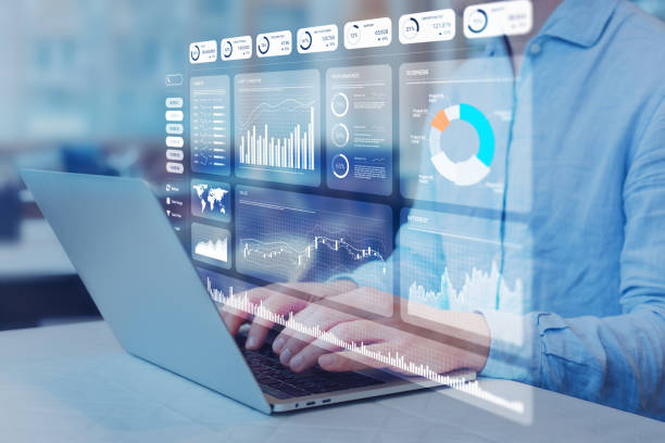 istock Analyst working with Financial Report and Business Analytics Dashboard on laptop computer to analyze Financial Data with KPI and Metrics. Investment, Corporate Finance, Operations, Sales, Strategy. 2153380493