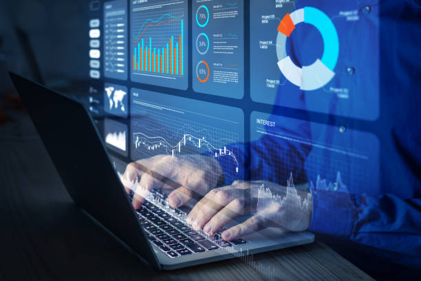 istock Analyst working with Financial Report and Business Analytics Dashboard on laptop computer to analyze Financial Data with KPI and Metrics. Investment, Operations, Sales, Corporate Finance, Strategy. 2153381199
