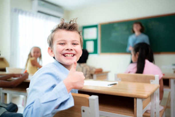 Elementary school students taking lessons in the classroom