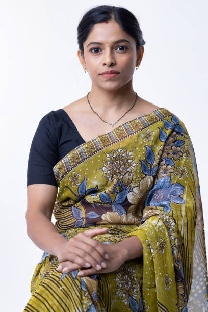 istock Young traditional indian woman against white background 2153384254