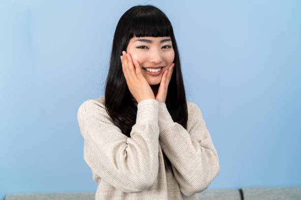 istock young woman relaxing at home 2153386379