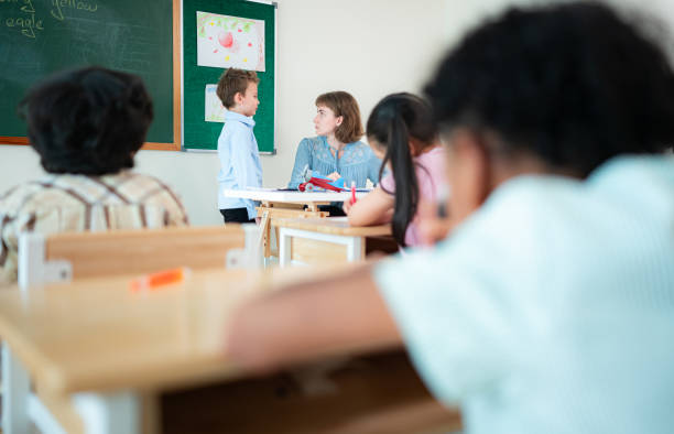 istock Children with classroom presentation activities in front of the classroom 2153389000