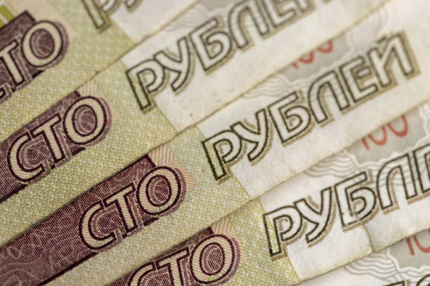 a large amount of money with a denomination of five thousand Russian Russian rubles lie neatly next to each other, covering the entire surface, Russian currency