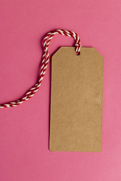 istock old cardboard clothing tag made from waste paper 2153390616