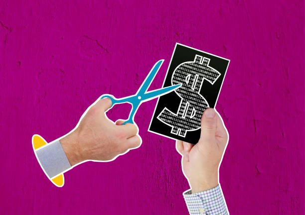 Composite Collage. There are two hands of different men. One is holding a card with a dollar symbol built from binary code. The other hand reaches for this card with scissors in its hands