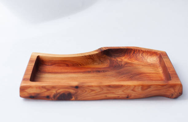 Wooden kitchen utensils stacked view, spoon and spatula close up