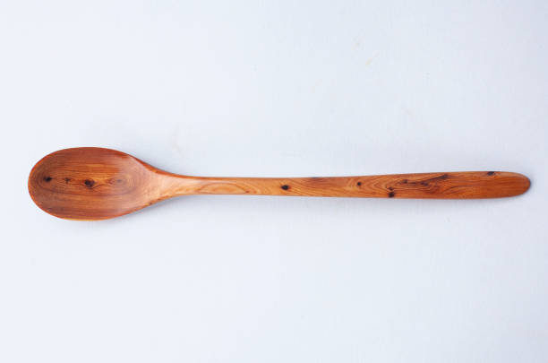 istock Wooden kitchen utensils stacked view, spoon and spatula 2153392294