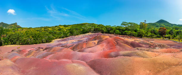 istock Chamarel Seven Colored Earth Geopark in Mauritius Island. Colorful panoramic landscape about this volcanic geological formation Chamarel Seven Colored Earth Geopark in Riviere noire district. 2153398998