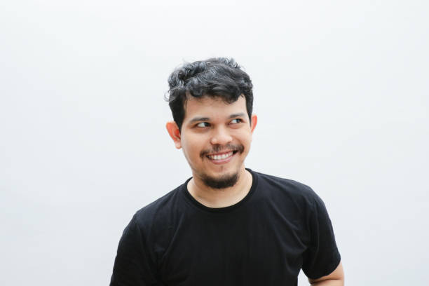 istock a smiling asian man with a funny face 2153399539