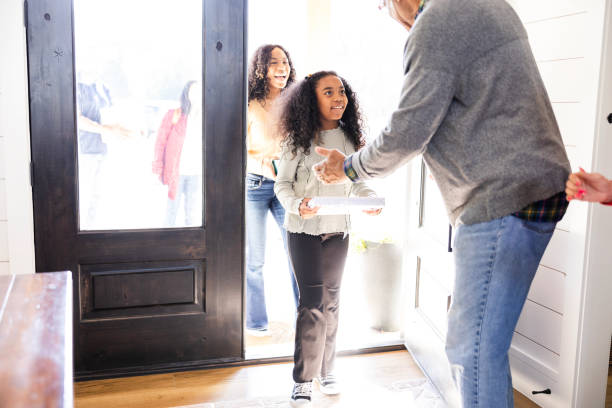 istock Unrecognizable granddad excited to welcome granddaughters at front door 2153399721