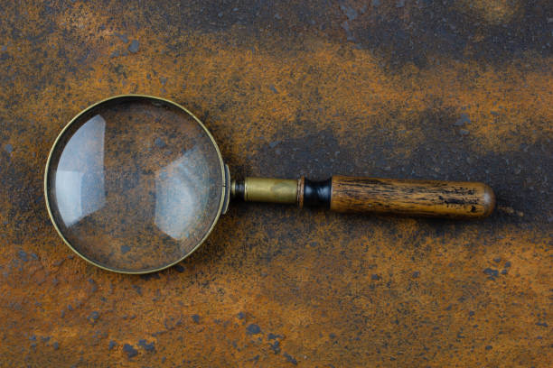 istock Vintage magnifying glass on metal rusty background, 2153403812