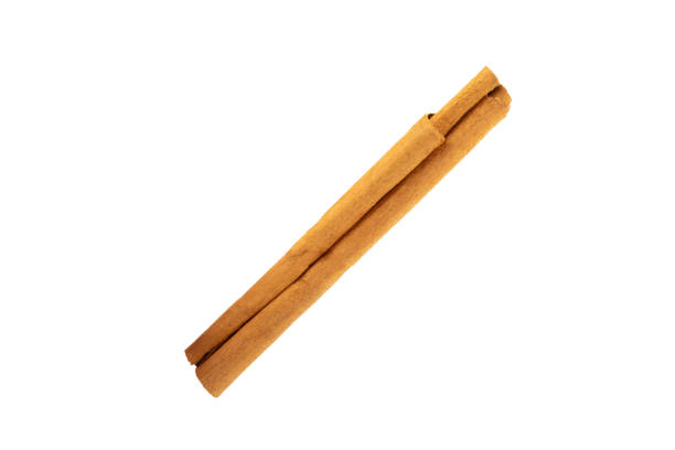 istock Ceylon cinnamon.Cinnamon sticks on background. Cinnamon roll and powder. Spicy spice for baking, desserts and drinks. Fragrant ground cinnamon. Close-up. Place for text. copy space 2153403827