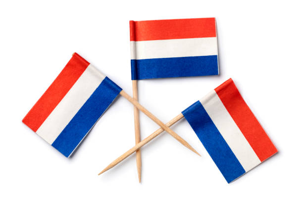 Miniature Dutch paper flags close up isolated on white background