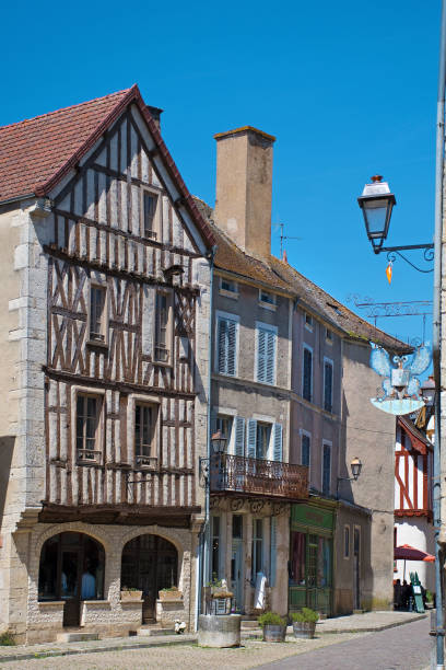 istock Typical half-timbered houses in Noyers-sur-Serein 2153406113