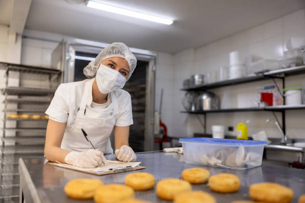 istock Business manager working at a donut factory 2153409182