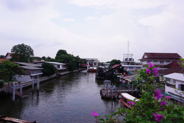 istock Lancape view - picture of a riverside community, 2153409291