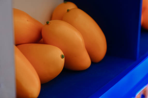 Kids toys, mangoes plastics background