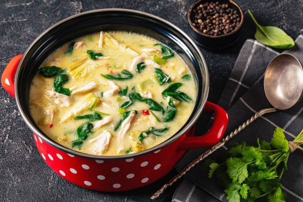 istock chicken spinach artichoke creamy soup in a pot 2153411589