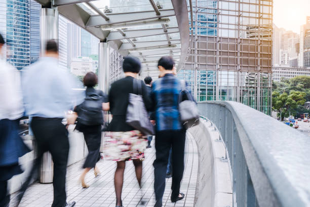 istock Busy Business District in Hong Kong During Rush Hour 2153412632