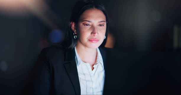 istock Night, business and woman with laptop, commitment and scroll with connection, website with information. Female accountant, financial and computer, dark or search internet with email for research 2153421297