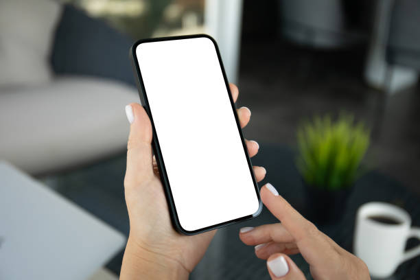 istock female hands hold phone with isolated screen background cafe office 2153426149