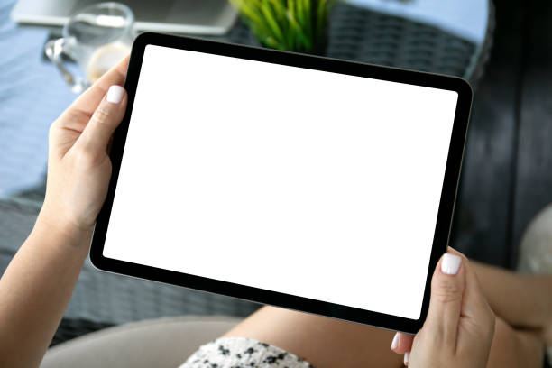 istock female hands hold computer tablet with isolated screen in office 2153426690