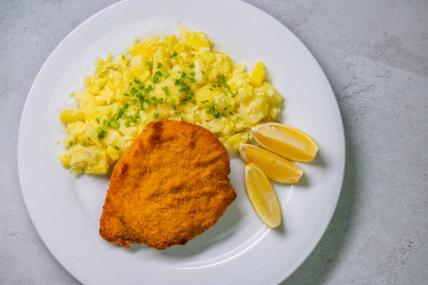 istock Chicken cutlet with couscous and lemon 2153430112